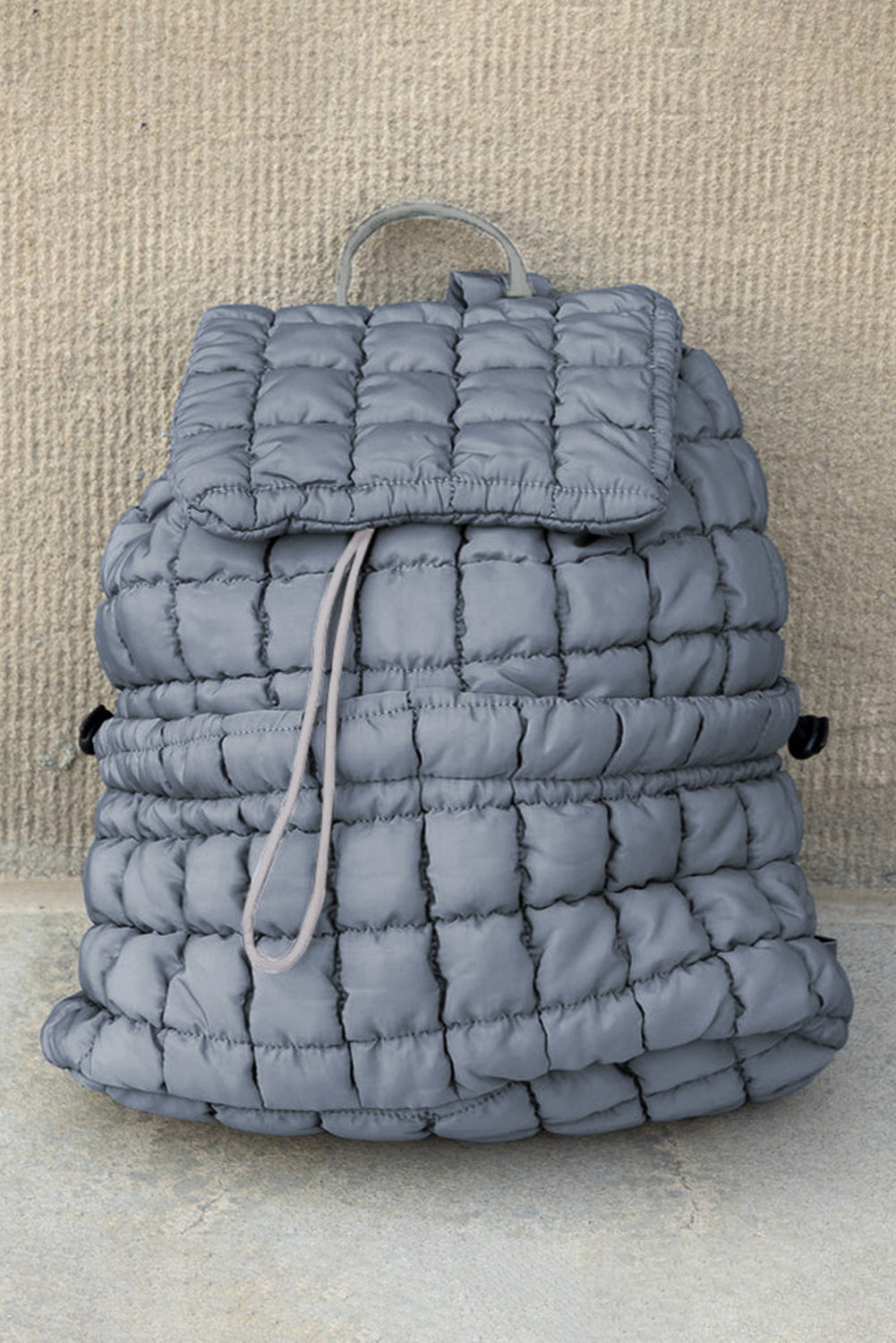 Black Solid Flapped Quilted Puffer Backpack